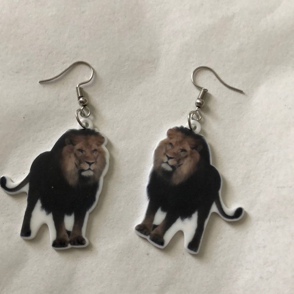 Pierced lion earrings